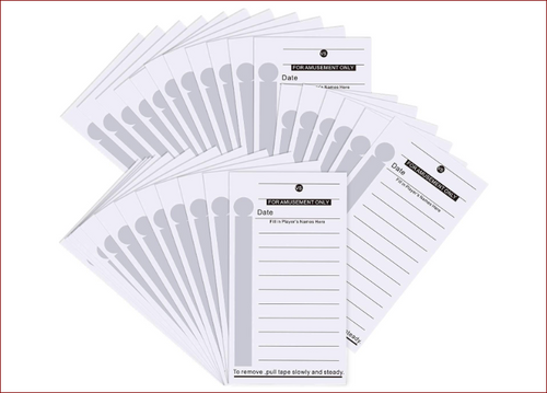 29 Scratch off strip cards laid out on white background